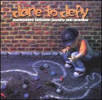 Somewhere Between Poverty & Promise von Dare to Defy